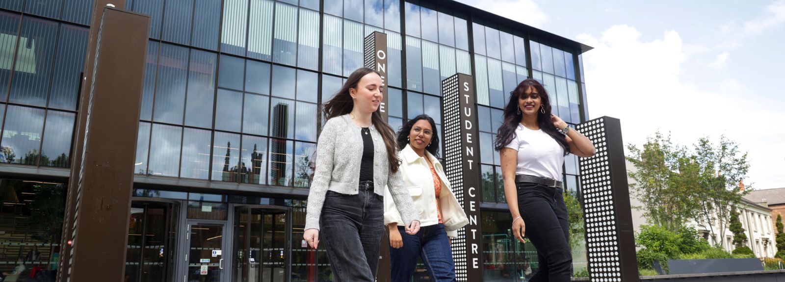 students walking in a group outside One Elmwood